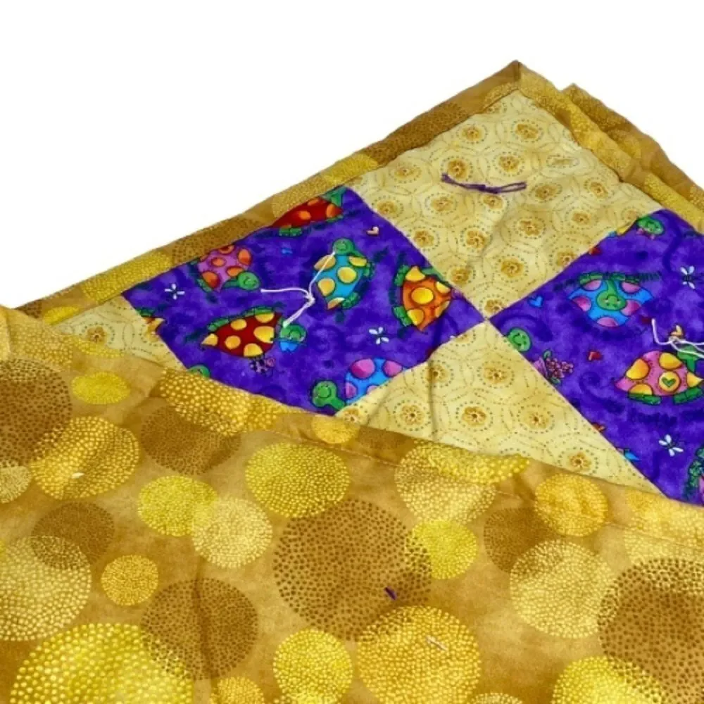 Handmade NWT turtle themed purple and gold baby or lap quilt size 43” X 38”
